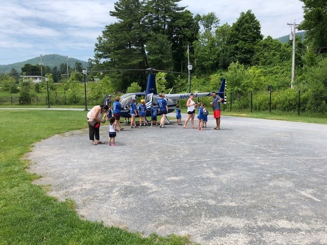 Hikers and helicopter at after party